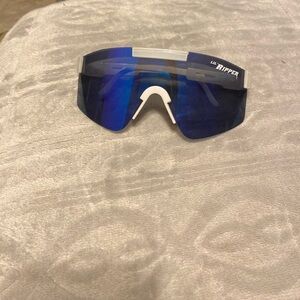 I am selling sunglasses that are cool which is the color of blue and white